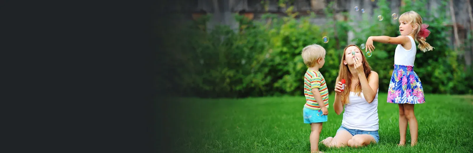 Family playing in mosquito free yard